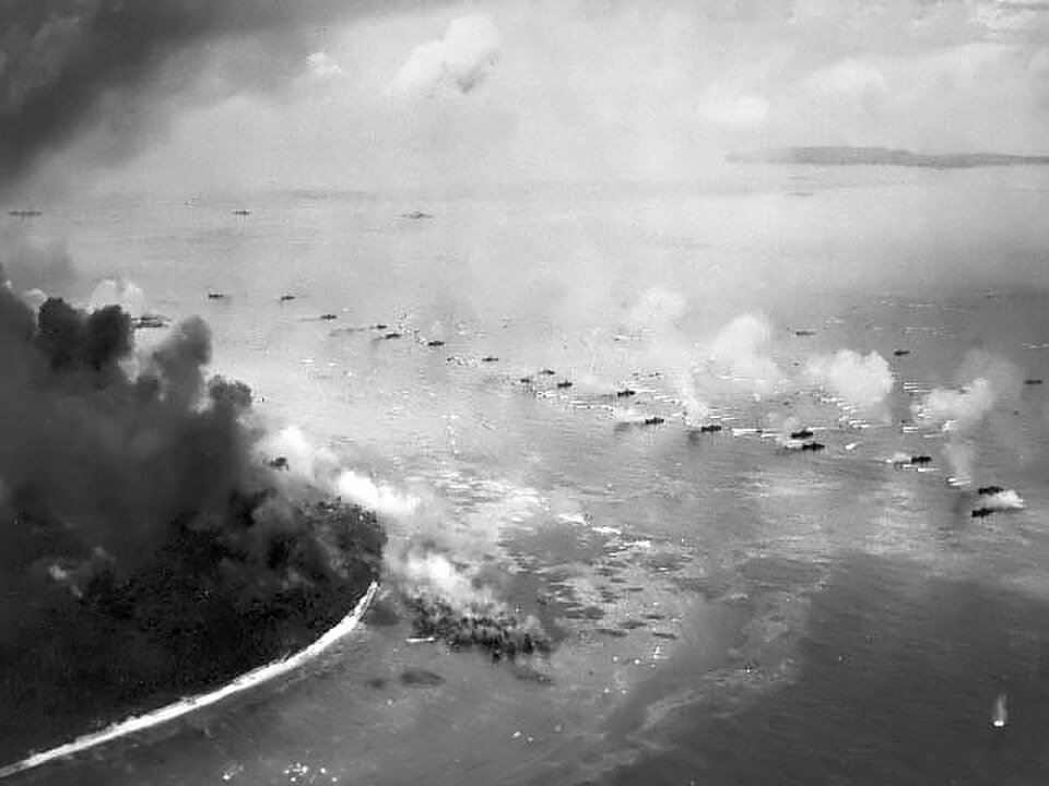 First wave of LVTs moves toward the invasion beaches